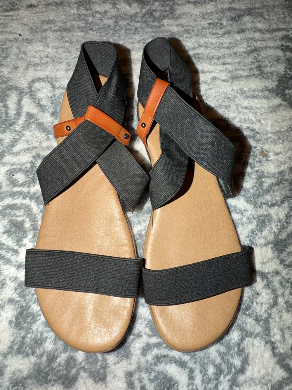 XOXO Women's Black Elastic Strap Sandals with Tan Accent